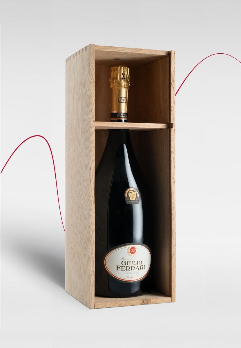 https://www.enotecalunelli.com/media/catalog/product/g/i/giulio-ferrari-riservadelfondatore-2002-1.5-cassetta-legno-open_03.jpg